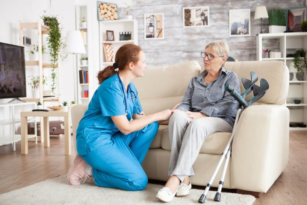 An aged care worker discussing mobility options